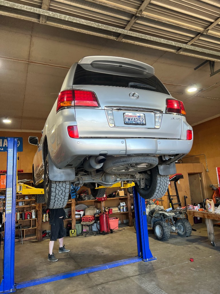 Lexus LX 570 on lift for undercarriage service